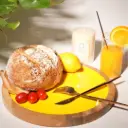 Sunstone Circle — Yellow Mango Wood Platter